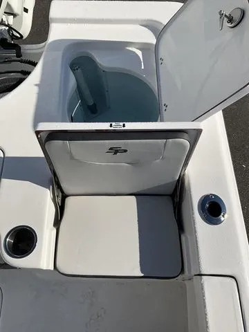 Slide: The Image of Sea Pro 230 Bay Boat 2026 with open storage compartment. - 18