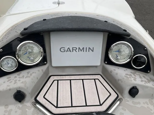 Slide: The Image of Dashboard of a 2022 Stingray 212 with Garmin display. - 16