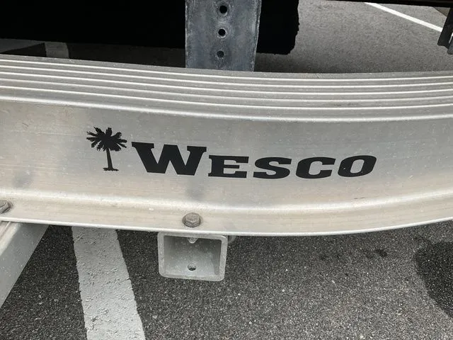 Slide: The Image of Wesco logo on a 2022 Stingray 212 boat trailer. - 3