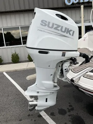 Slide: The Image of Suzuki outboard motor on a 2022 Stingray 212 boat. - 5