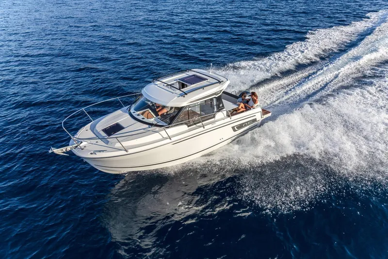 Slide: The Image of 2026 Jeanneau NC 795 Series 2 cruising on open water, showcasing sleek design and performance. - 4