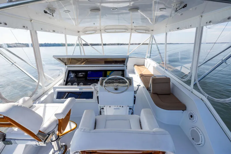 Slide: The Image of Luxurious helm of 1996 Jim Smith 60 Sportfish yacht with panoramic water views. - 12