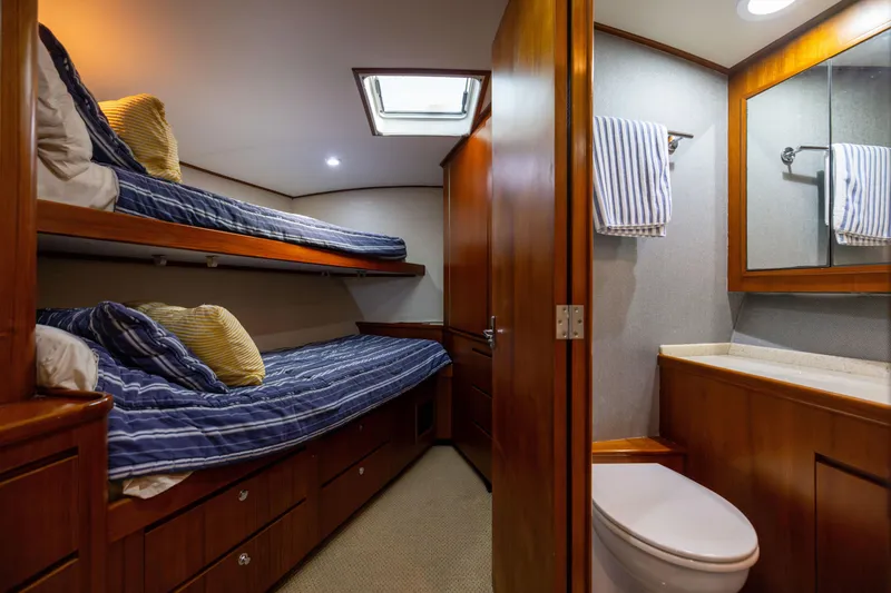 Slide: The Image of Luxurious 1996 Jim Smith 60 Sportfish cabin with bunk beds and ensuite bathroom. - 33