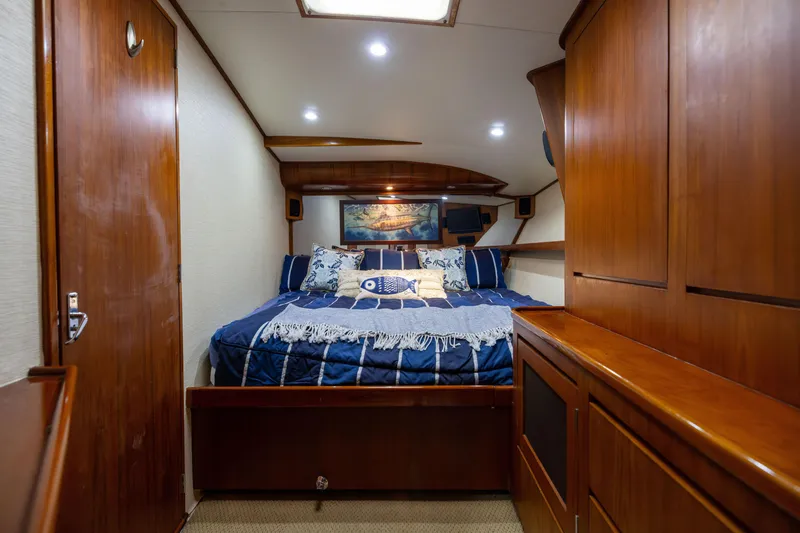 Slide: The Image of Luxurious cabin interior of 1996 Jim Smith 60 Sportfish yacht with cozy bedding. - 35