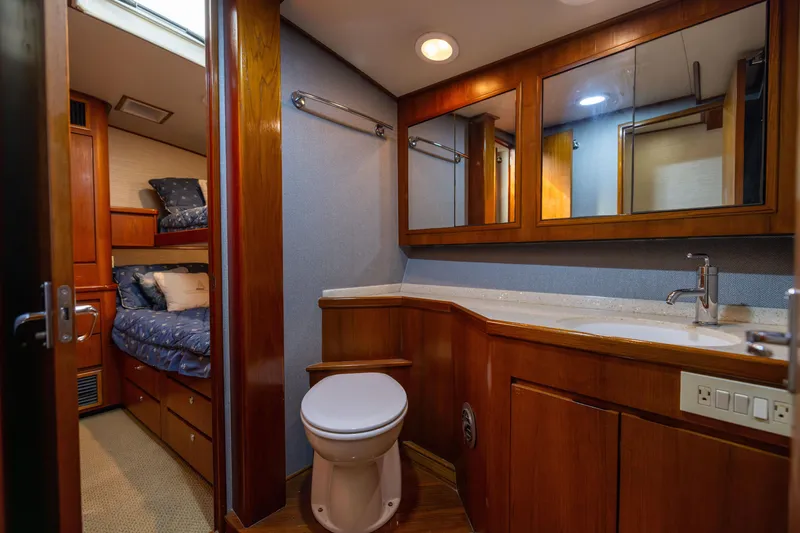 Slide: The Image of Luxurious bathroom and cabin interior of 1996 Jim Smith 60 Sportfish yacht. - 40
