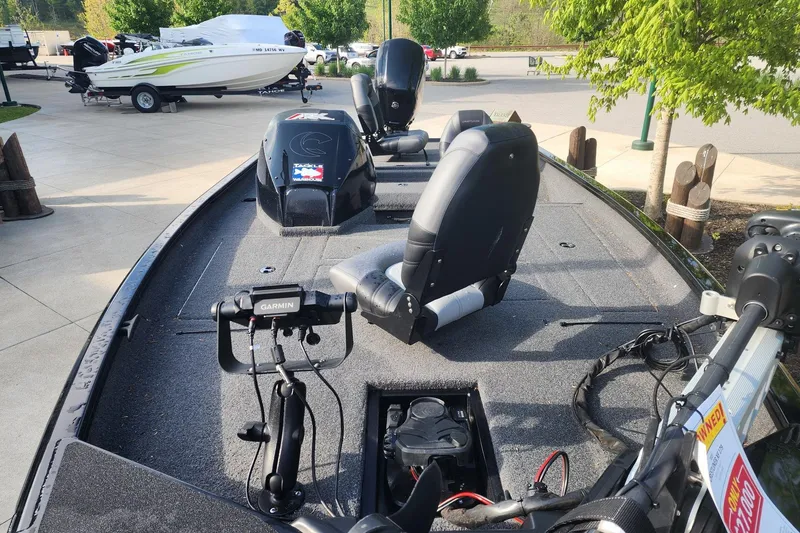 Slide: The Image of 2023 Crestliner XF 179 fishing boat with Garmin equipment, parked outdoors. - 9