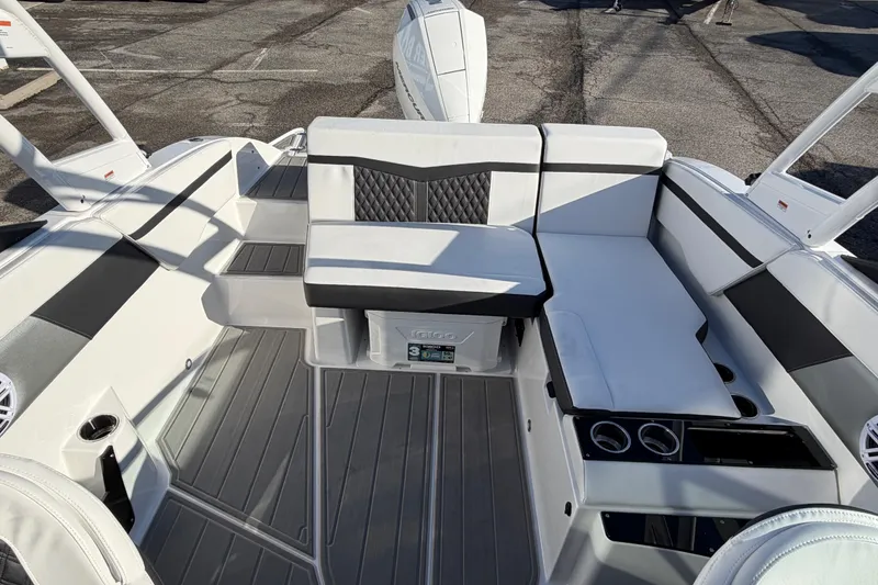 Slide: The Image of 2026 Monterey M-225 boat interior with sleek seating and modern design. - 12