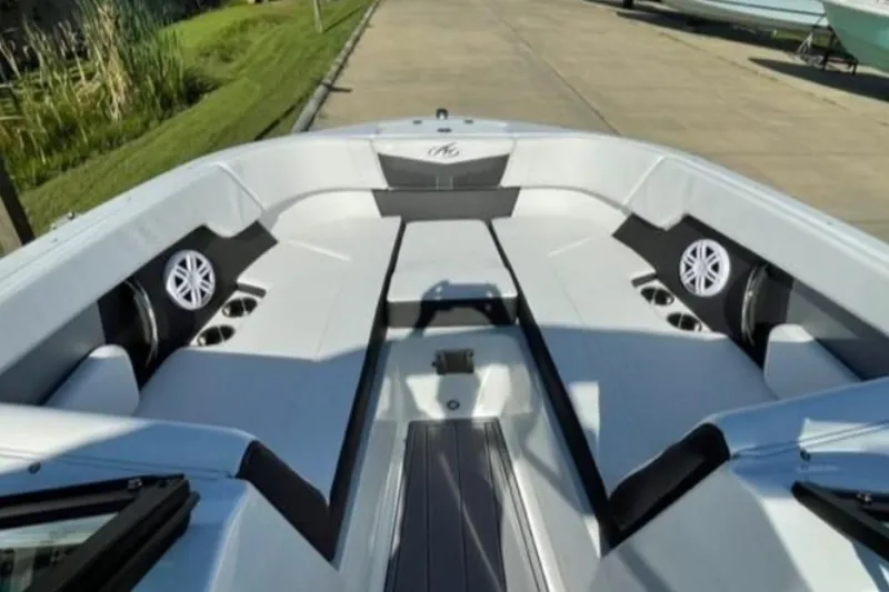 Slide: The Image of 2026 Monterey M-225 boat interior with sleek seating and built-in speakers. - 8