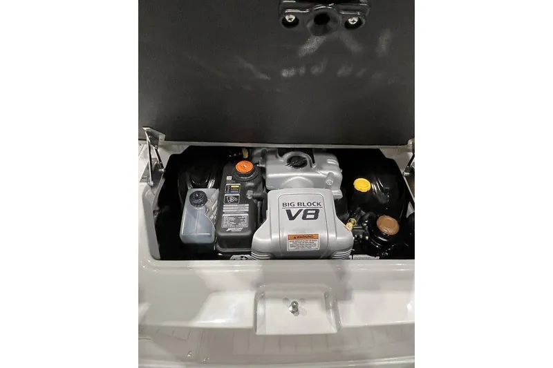 Slide: The Image of 2026 Crownline 298 SS boat engine compartment with Big Block V8 engine. - 5