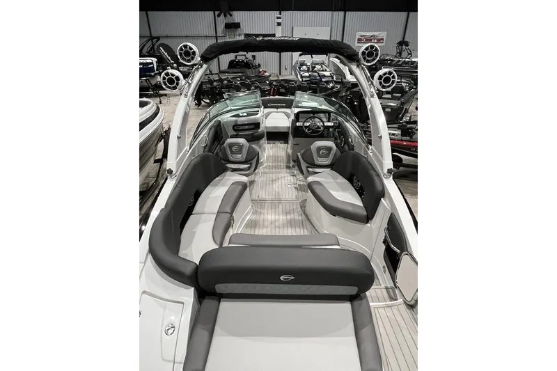 Slide: The Image of 2026 Crownline 298 SS boat interior with sleek seating and modern design. - 6