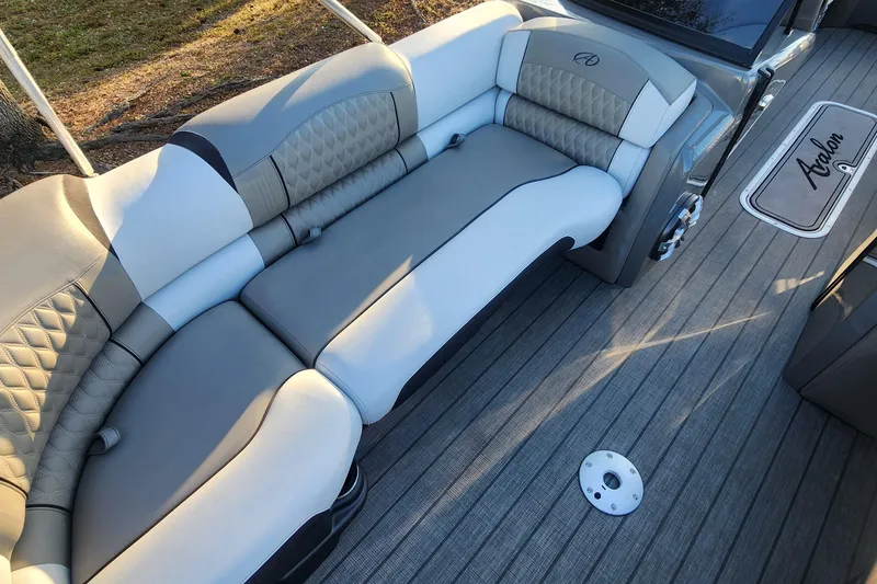 Slide: The Image of Luxurious seating on 2023 Avalon Excalibur 25' boat with elegant design and premium materials. - 17