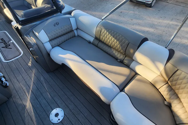 Slide: The Image of Luxurious seating on 2023 Avalon Excalibur 25' boat with elegant upholstery design. - 18