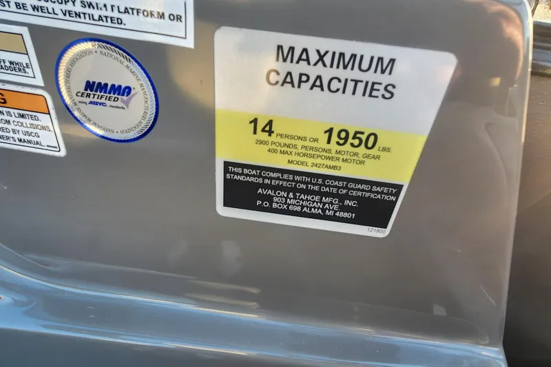 Slide: The Image of 2023 Avalon Excalibur boat capacity label, 14 persons or 1950 lbs, NMMA certified. - 22