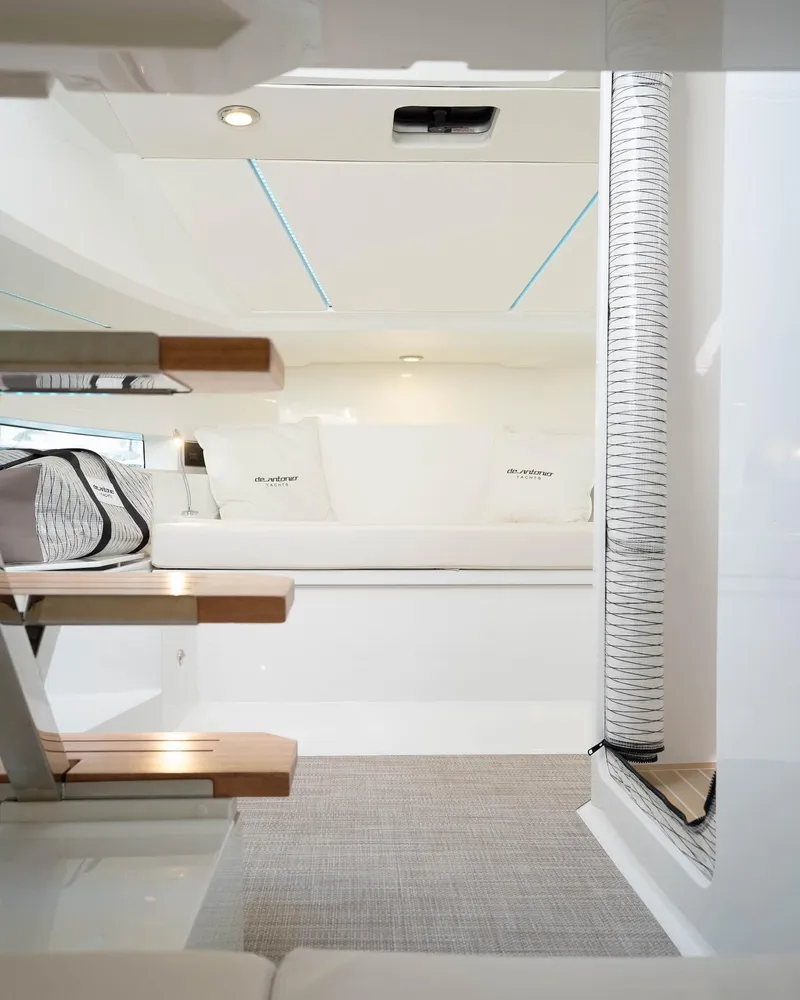 Slide: The Image of 2024 De Antonio Yachts D32 OPEN interior with modern seating and sleek design. - 2