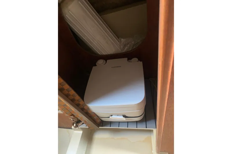 Slide: The Image of Portable toilet inside 1985 Oday 272 sailboat cabin. - 20