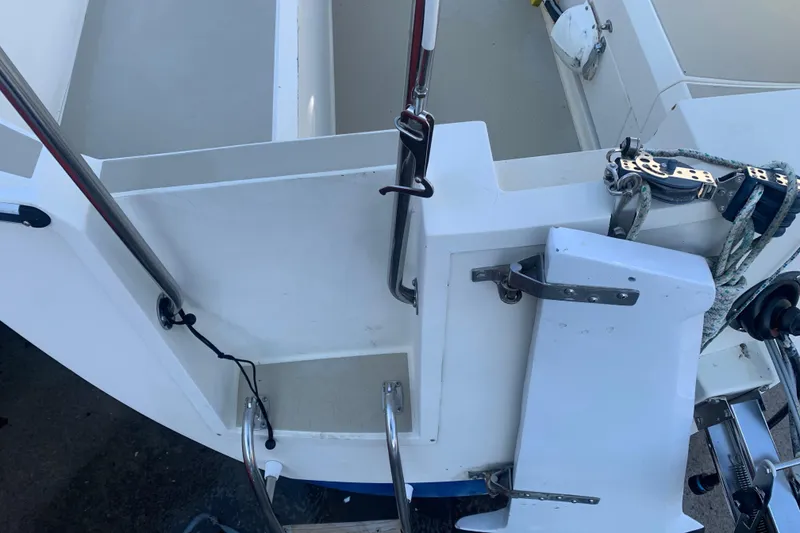 Slide: The Image of 1985 Oday 272 boat stern with stainless steel fittings and ladder. - 28