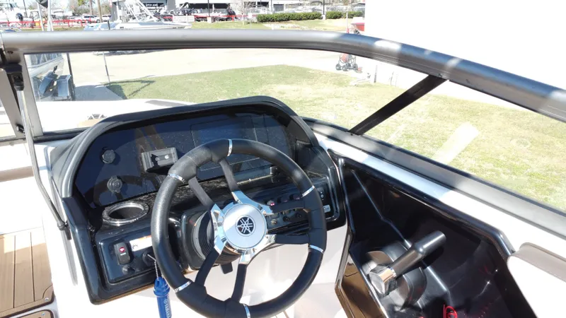 Slide: The Image of Yamaha TP1800C-XAP 2022 boat helm with steering wheel and dashboard. - 25