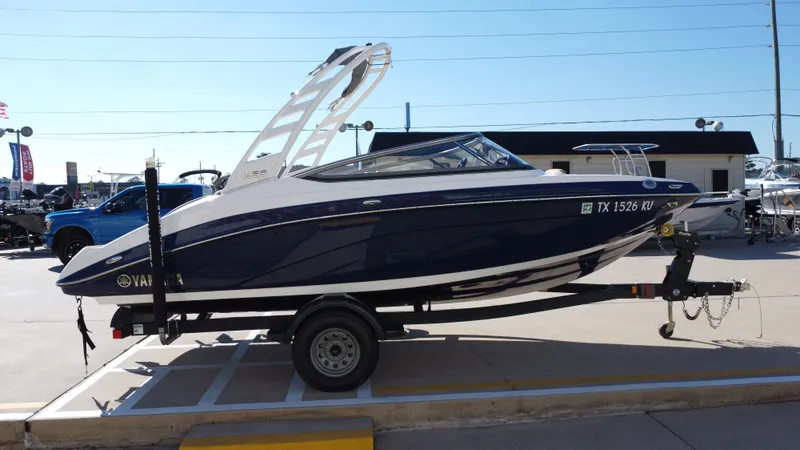 Slide: The Image of Yamaha TP1800C-XAP 2022 boat on trailer outdoors. - 7