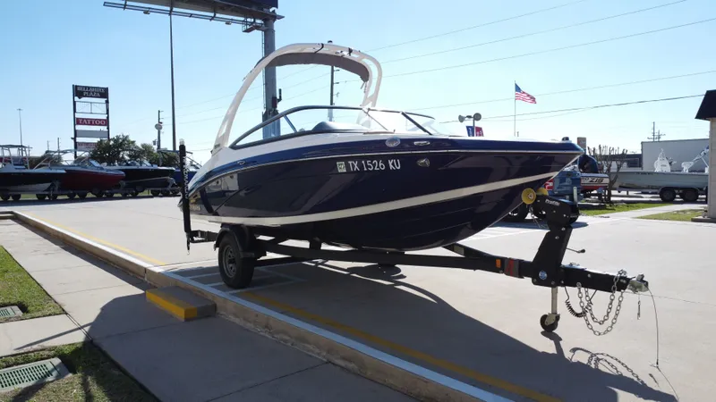 Slide: The Image of 2022 Yamaha TP1800C-XAP boat on trailer outdoors. - 8