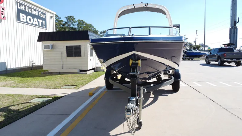 Slide: The Image of Yamaha TP1800C-XAP 2022 boat on trailer outside sales building. - 9