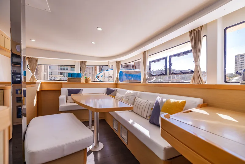 Slide: The Image of Interior of a 2018 Lagoon 42 yacht with elegant seating area. - 37