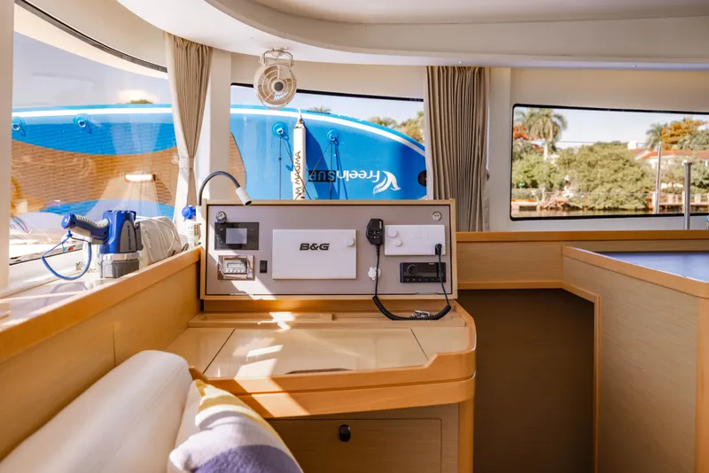 Slide: The Image of Interior of a 2018 Lagoon 42 yacht with modern controls. - 38