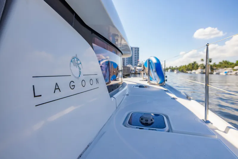 Slide: The Image of Lagoon 42 catamaran 2018 on water, sunny day. - 4