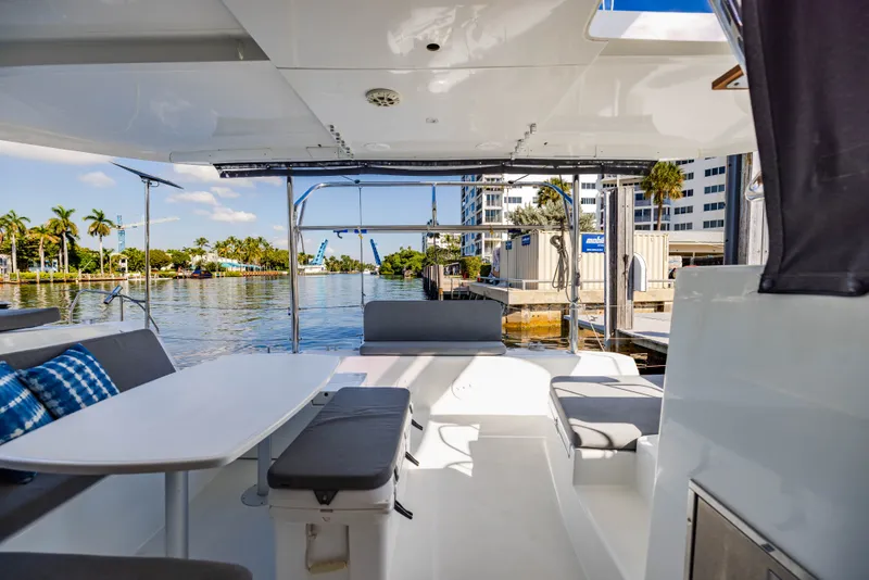 Slide: The Image of Interior of a 2018 Lagoon 42 yacht by the water. - 40