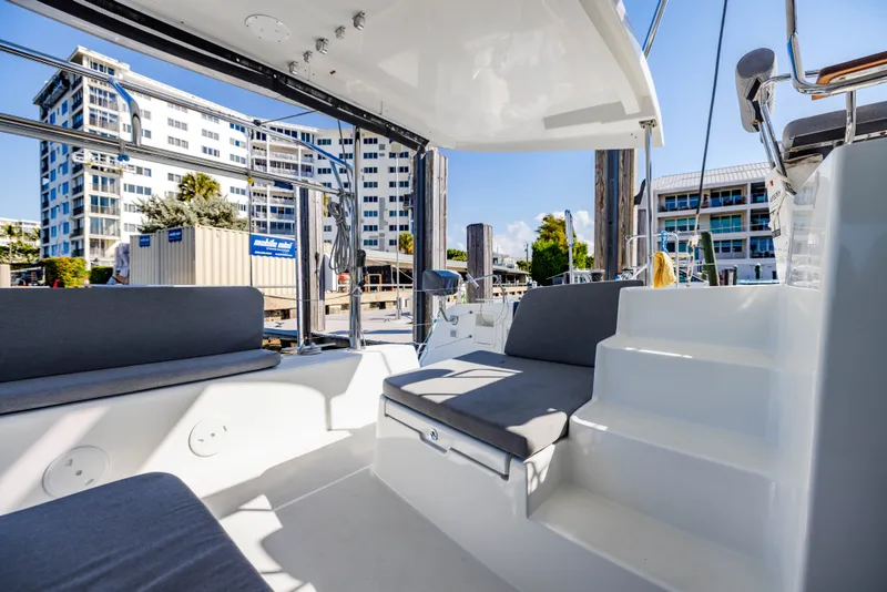 Slide: The Image of Lagoon 42 catamaran 2018, modern cockpit design at the marina. - 42