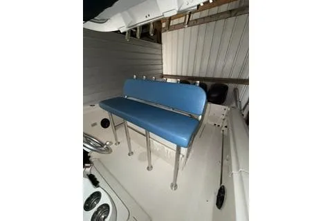 Slide: The Image of 2007 Hydra-Sports Vector 3300 CC boat interior with blue bench seating. - 15
