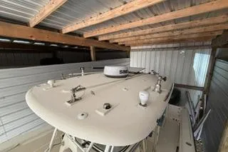 Slide: The Image of 2007 Hydra-Sports Vector 3300 CC boat stored in a covered facility. - 20