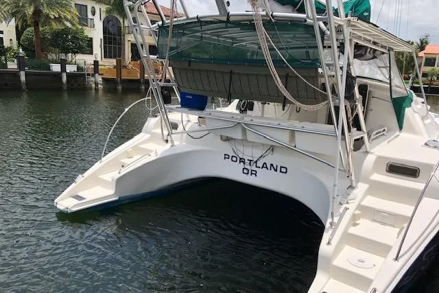 Slide: The Image of 2005 Manta 42 MK II catamaran docked, rear view, Portland OR registration. - 3