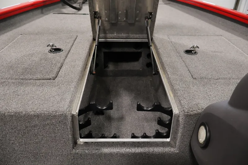 Slide: The Image of 2018 Tracker Pro Team 175 TXW boat interior with open storage compartment. - 14