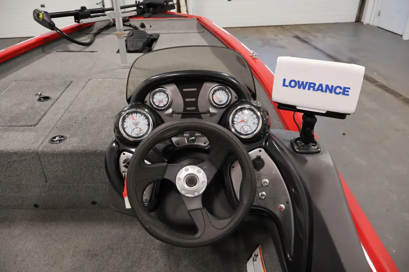 Slide: The Image of 2018 Tracker Pro Team 175 TXW boat dashboard with Lowrance fish finder. - 17