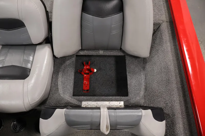 Slide: The Image of 2018 Tracker Pro Team 175 TXW boat interior with gray seats and red accessory. - 25