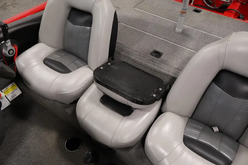 Slide: The Image of 2018 Tracker Pro Team 175 TXW boat interior with gray and black seating. - 27