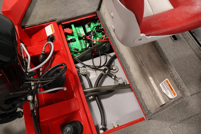 Slide: The Image of 2018 Tracker Pro Team 175 TXW boat interior showing battery compartment and wiring. - 31