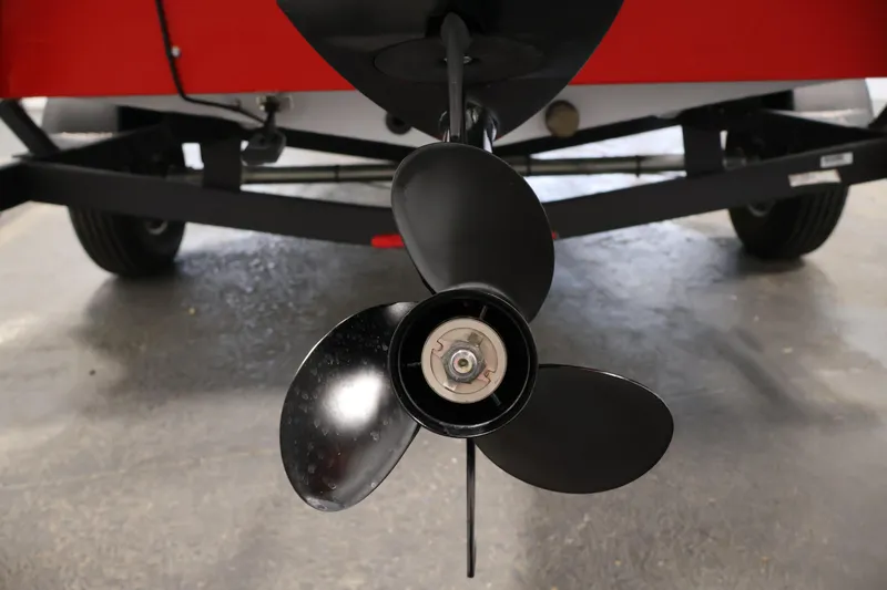 Slide: The Image of 2018 Tracker Pro Team 175 TXW boat propeller close-up, showcasing sleek black blades. - 34