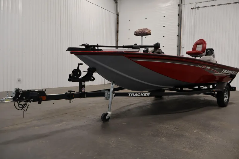 Slide: The Image of 2018 Tracker Pro Team 175 TXW boat on trailer in indoor setting. - 36