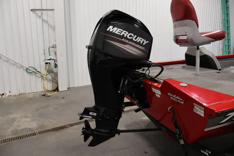 Slide: The Image of 2018 Tracker Pro Team 175 TXW with Mercury FourStroke engine in a garage setting. - 40