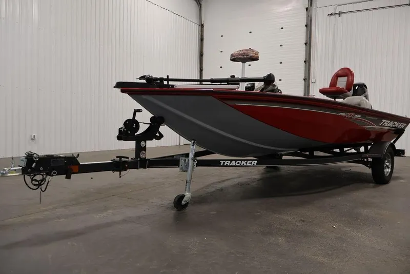 Slide: The Image of 2018 Tracker Pro Team 175 TXW boat on trailer in indoor setting. - 44