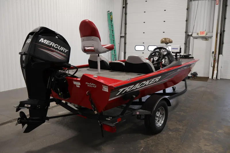 Slide: The Image of 2018 Tracker Pro Team 175 TXW boat with Mercury engine in a garage. - 5