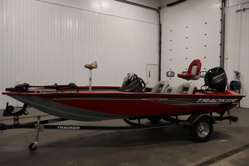 Slide: The Image of 2018 Tracker Pro Team 175 TXW fishing boat in a garage setting. - 8