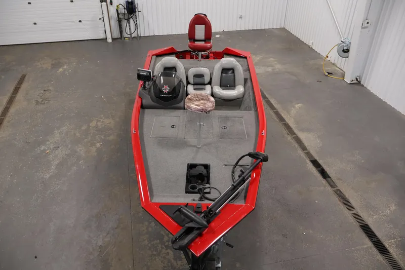 Slide: The Image of 2018 Tracker Pro Team 175 TXW fishing boat in a garage setting. - 9