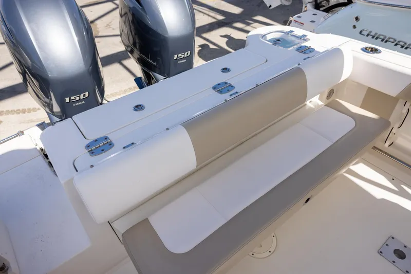 Slide: The Image of 2018 Robalo R247 Dual Console boat with Yamaha 150 engines and comfortable seating. - 8