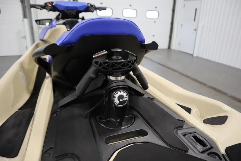 Slide: The Image of 2025 Sea-Doo Wake 170 jet ski interior with blue seat and BRP components. - 19