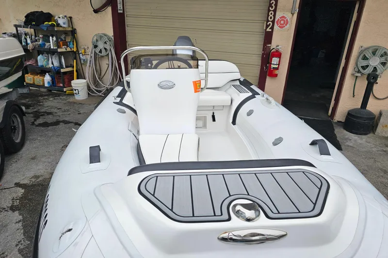 Slide: The Image of 2020 Walker Bay Generation 360 inflatable boat in a garage setting. - 21