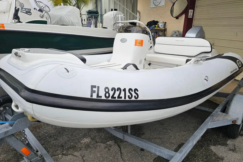 Slide: The Image of 2020 Walker Bay Generation 360 inflatable boat on trailer, registration FL 8221 SS. - 25