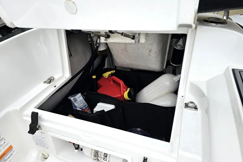 Slide: The Image of Storage compartment of 2020 Walker Bay Generation 360 boat with fuel containers and supplies. - 31