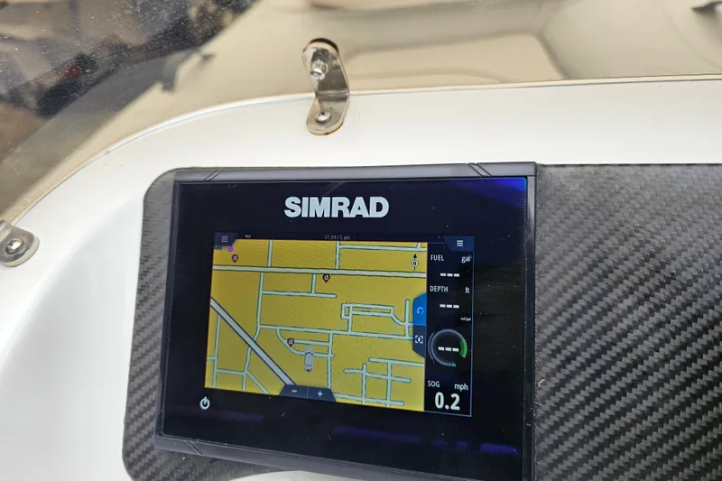 Slide: The Image of Simrad navigation display on 2020 Walker Bay Generation 360 boat dashboard. - 32